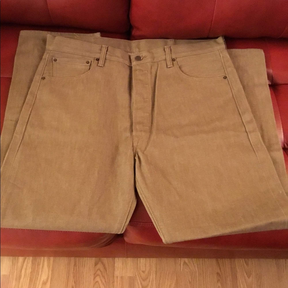 Men’s tan Levi’s Jeans.